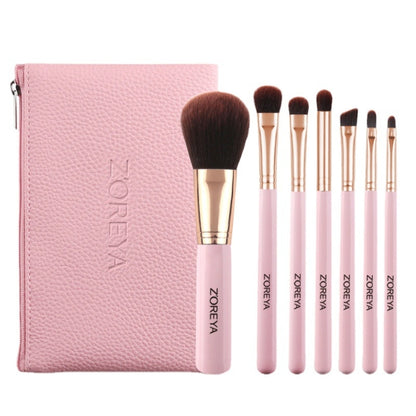 Pink makeup brush set with zip pouch, gold handles and brown bristles