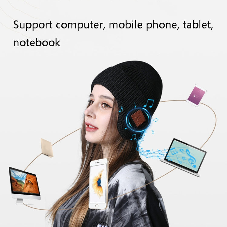 Black Bluetooth music hat with earphones, worn by a woman, audio icons