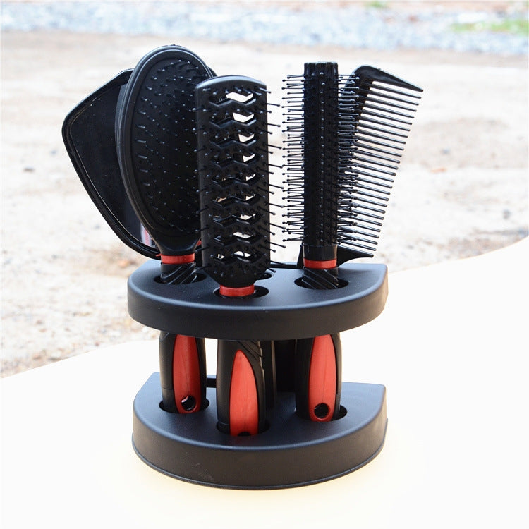Outdoor view of 6-in-1 hair comb set on base: black brushes, white and fine teeth
