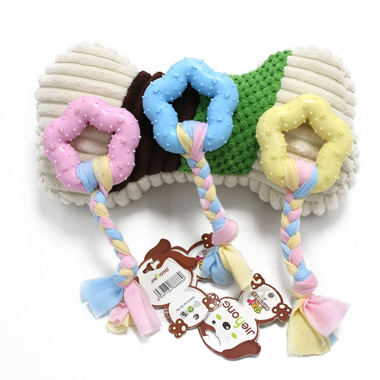 Rope dog chew toy with blue, pink, and yellow TPR rings and braided tassels