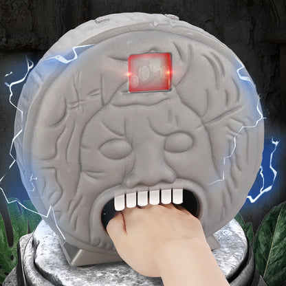 Gray brain-shaped electric prank toy with red LED on top and open bite mouth.