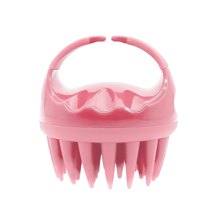 Pink silicone scalp hair washing brush with round handle and flexible bristles
