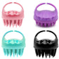 Set of silicone hair washing brushes in pink, purple, teal, and black with bristles