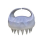 Light gray silicone scalp hair washing brush with round handle and pointed bristles