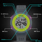 Gray silicone sports LED watch with green digital face and pink side trim, labeled buttons