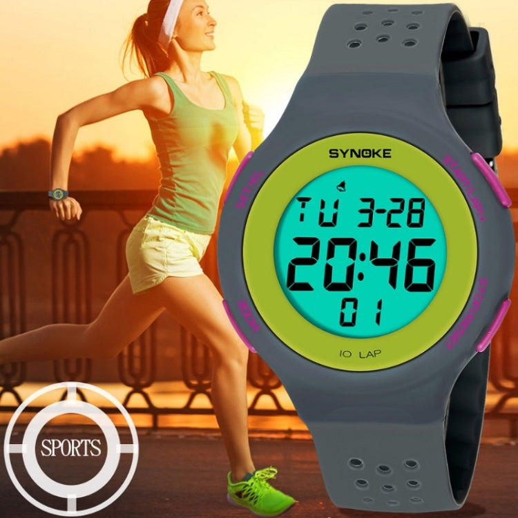 Gray silicone sports LED watch with green digital face and pink side trim