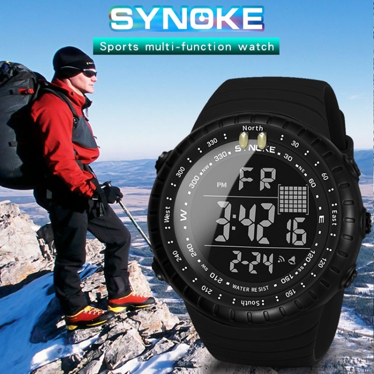 Black digital sports watch with luminous display, worn during outdoor activity