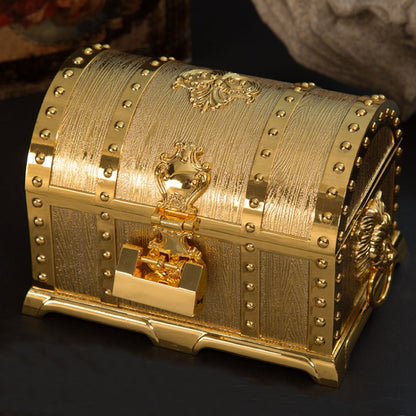 Gold metal double-layer jewel box with studded border and ornate front lock