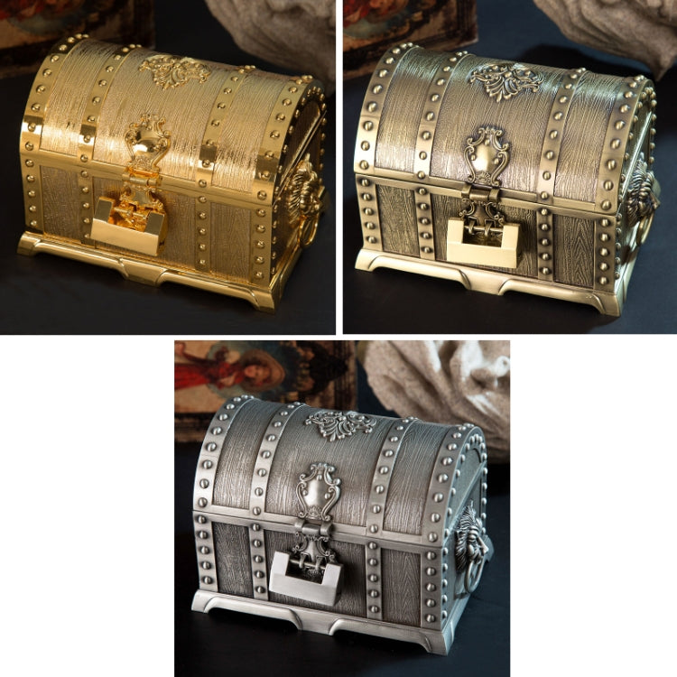 Metal jewel box with studded trim and ornate lock, shown in multiple finishes