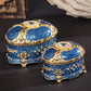 Gold-trimmed blue oval jewelry storage box with ornate diamond-style accents, set of 2