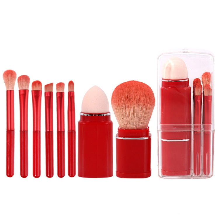 Retractable mini makeup brush set with red handles and blush/face brush in clear case
