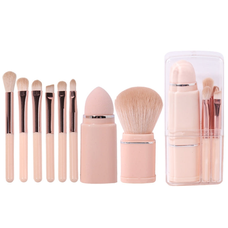 Retractable mini makeup brush set with beige handles, powder brush, and clear storage case