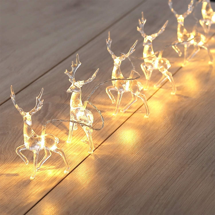 Christmas elk string lights with warm white illuminated deer figures along the floor