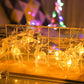 Christmas elk string lights with warm white glowing deer figures and stretched wire frame