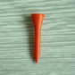 Single golf wooden ball tee with bright orange pointed tip
