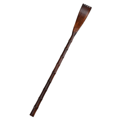Wooden long-handled back scratcher with dark stained round head and long segmented handle