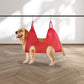 Red hanging polyester pet grooming hammock with two straps and round openings