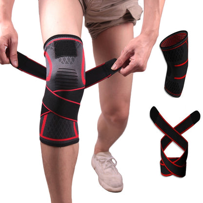 Red and black sports knee pad worn on leg, adjustable wrap strap for support