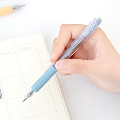 Blue retractable utility knife pen with clear tip, ready for paper cutting