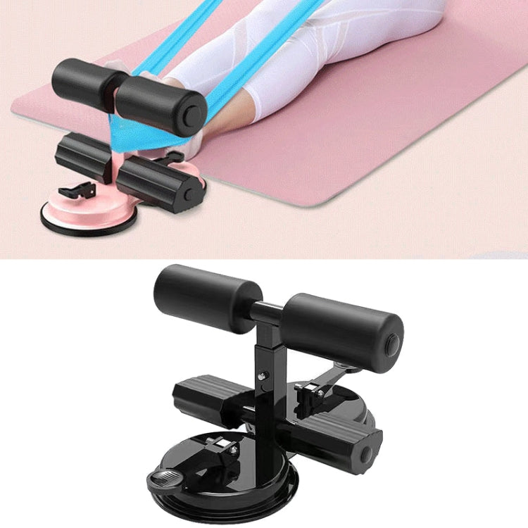 Black sit-up aid suction base with padded rollers and foot/ankle supports