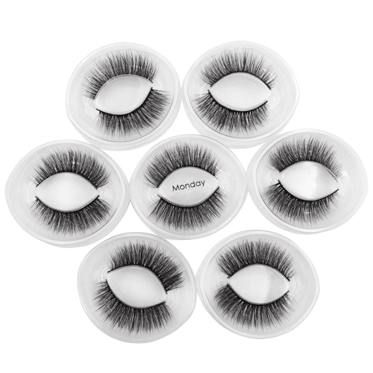 Black faux mink false eyelashes, 7-pair set in round trays with Monday-labeled pair