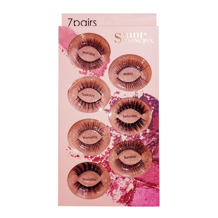 3D false eyelash set, 7 pairs labeled Monday–Sunday on retail box