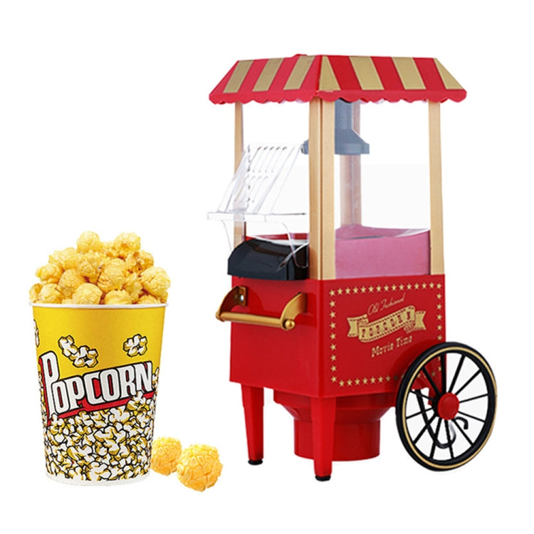 Red electric trolley popcorn machine with striped awning and side crank handle