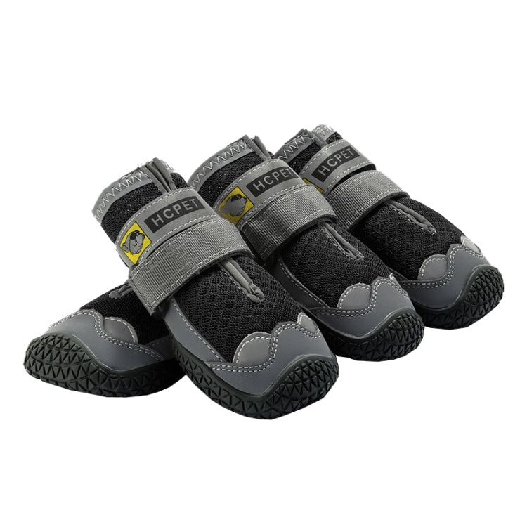 Gray mesh dog shoes with hook-and-loop straps and gray rubber tread soles, 4-pack.