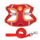 Red reflective dog chest traction harness with orange rope leash and metal D-ring