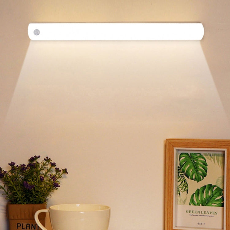 Rechargeable LED cabinet light bar with slim white housing, unlit beneath cabinet