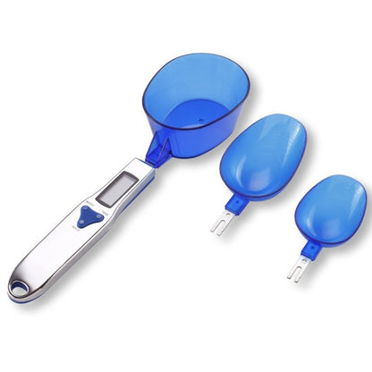 Electronic kitchen measuring spoon scale with three blue scoop attachments and LCD display