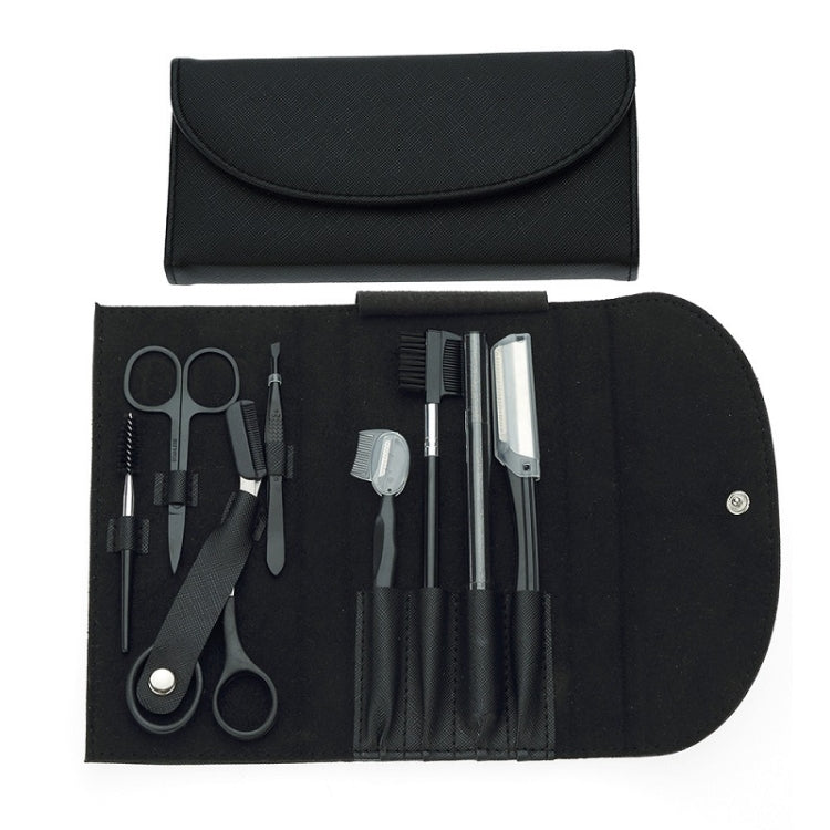 Black eyebrow trimming tool set in open roll pouch with scissors, combs, and trimmers