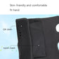 Close-up of black wrist brace sleeve with stitched panels and breathable mesh backing