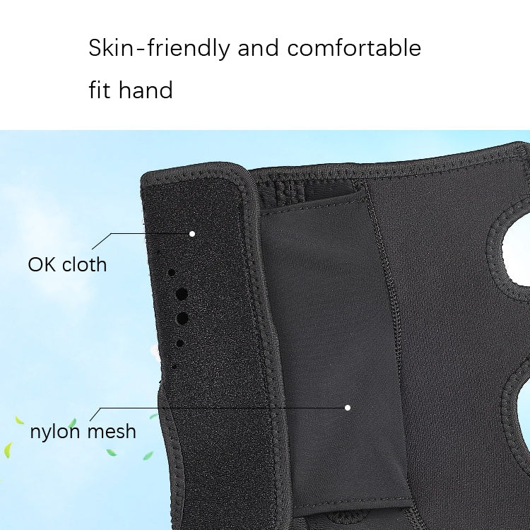 Close-up of black wrist brace sleeve with stitched panels and breathable mesh backing