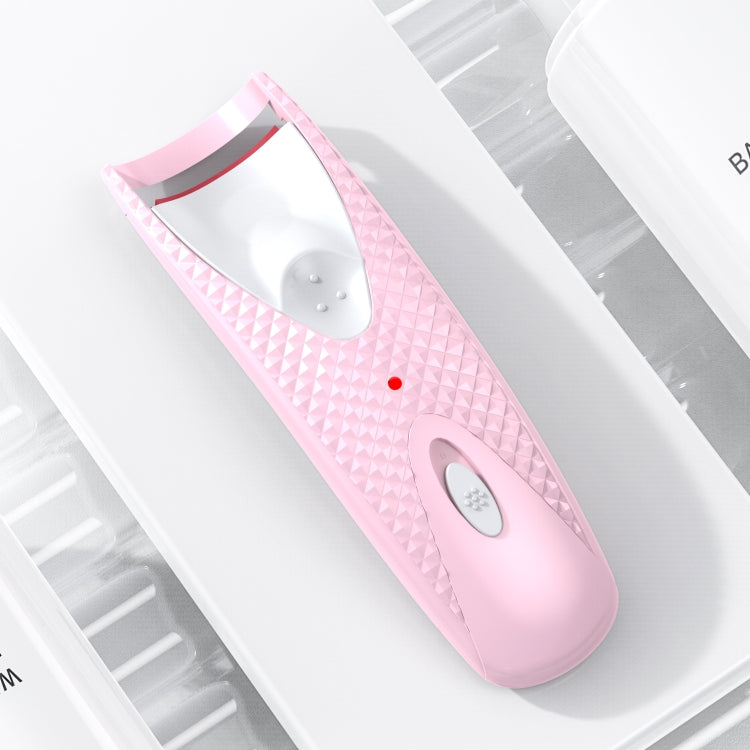 Pink heated eyelash perming curler with textured body and white heating plate window