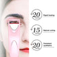 Pink electric eyelash curler near eye with open heating plate for quick curling