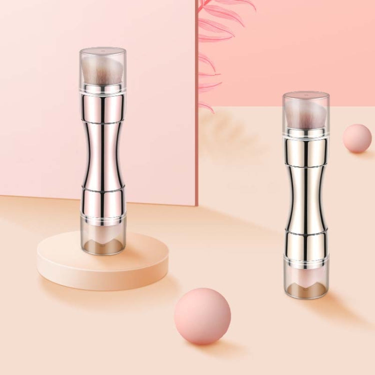 Rose gold retractable makeup brush in metal tube with retractable bristle head