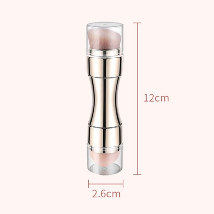 Rose gold retractable makeup brush with rounded bristles and clear retractable sleeve