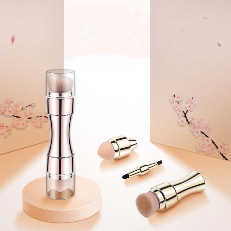 Rose gold retractable makeup brush with extra brush heads and clear protective caps