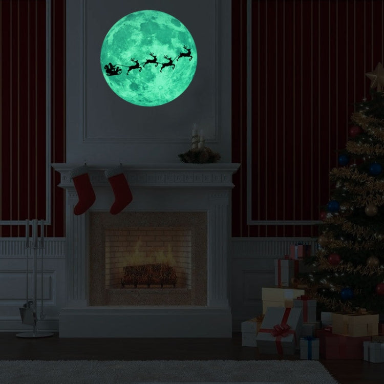 Fluorescent green moon wall sticker with reindeer silhouettes flying across the moon