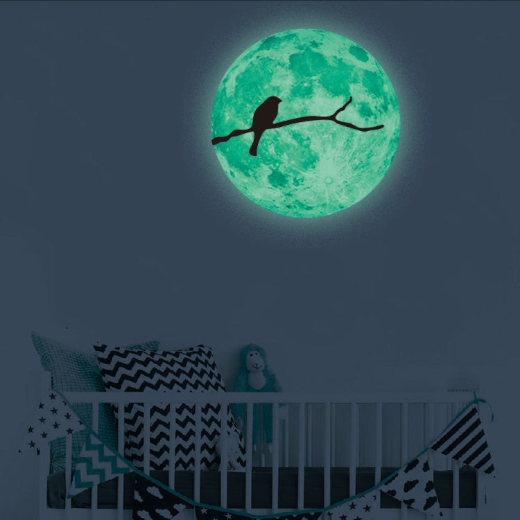 Glowing green moon wall sticker with bird silhouette perched on a branch