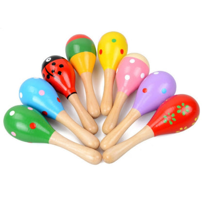 Set of 8 colorful sand hammers with wooden handles and patterned heads