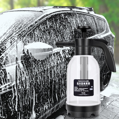 Handheld foam sprayer with black trigger and transparent white bottle, fan nozzle