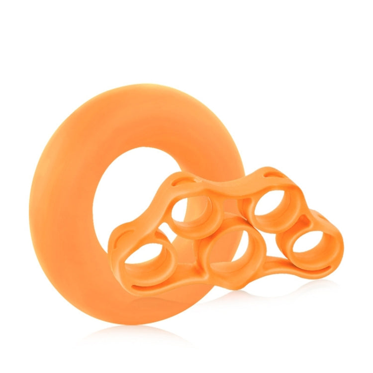 Orange silicone finger grip ring with three finger loop openings and handhold bar.
