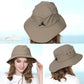 Light khaki fisherman's cap with curved brim and adjustable chin cord