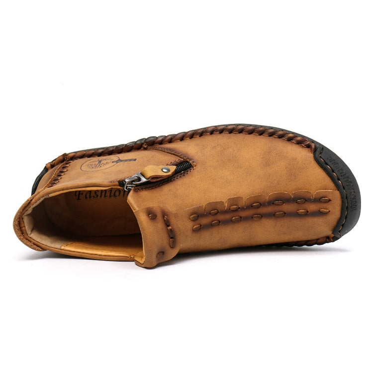 Men's tan leather lace-up boots, open side view with logo patch and cushioned lining