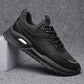 Black height-increasing running shoes with lace-up front, padded collar, and air-cushion panel