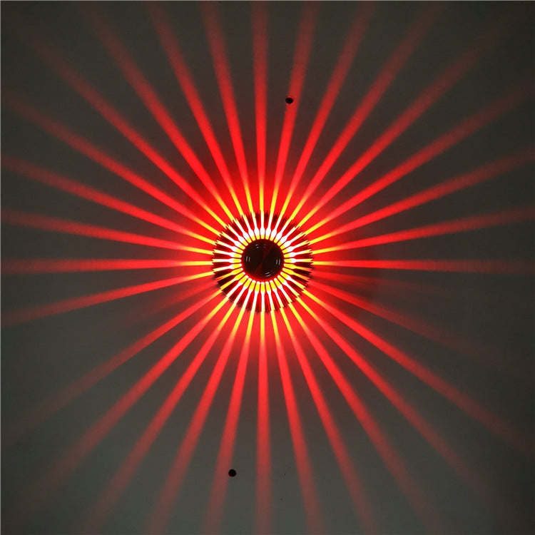 Sunflower-style LED corridor light with red radial glow rays