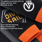 Thermal diving top in dark fabric with orange cuff and flatlocked seams