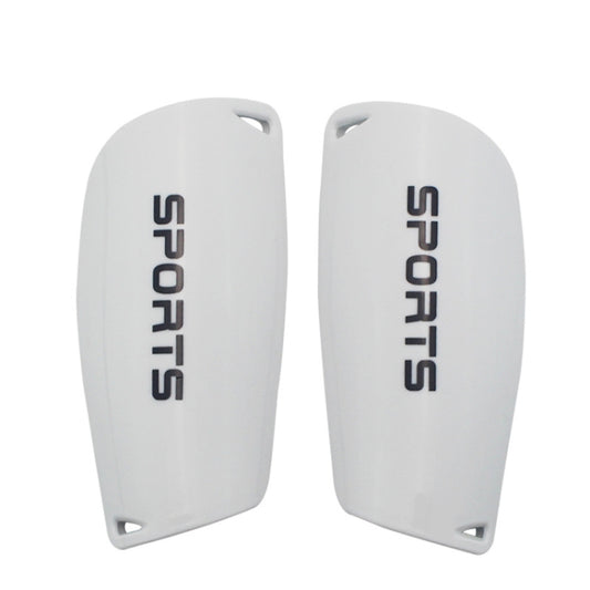 Pair of white football shin guards with raised edges and SPORT lettering